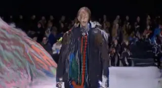 Person walking on a catwalk by Robbie Barrat