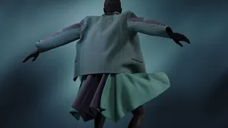 Dark virtual female model wearing striped jacket and a wide green skirt, while holding out her hands