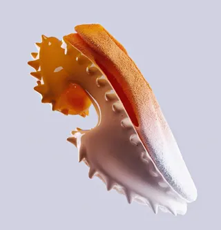 Orange 3D model of a shoe 3d printed designing sneakers in VR